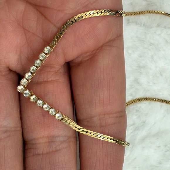 Vintage Avon gold-tone V-shaped pendant accented with clear crystal rhinestones - Picture 2 of 9